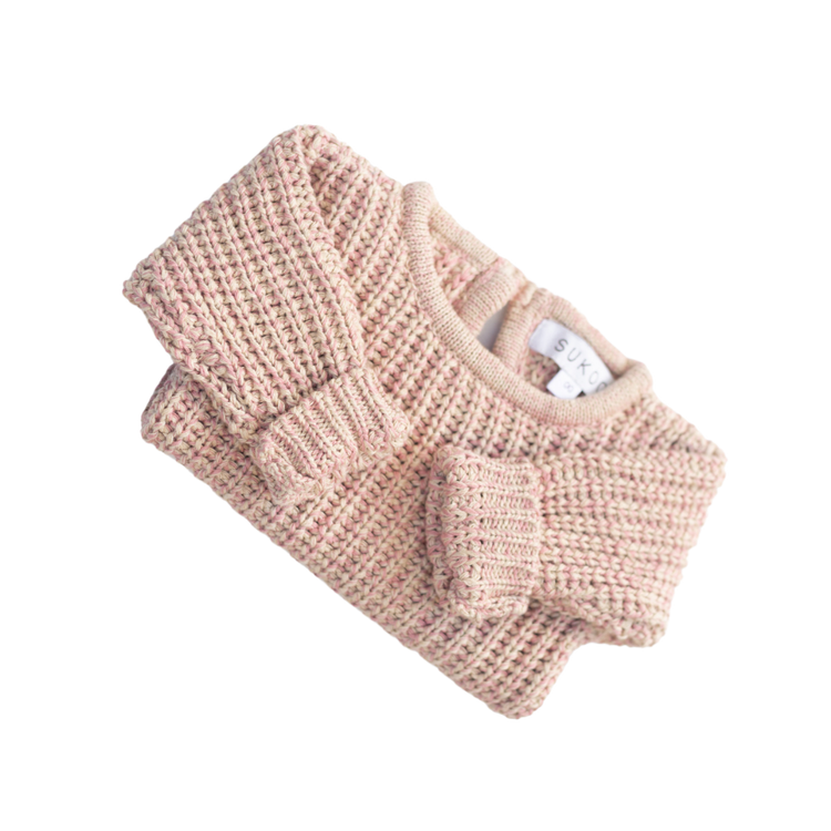 The Zoa knit is lovingly handmade using a loom which is a tool that is guided by the hand. 100% soft cotton, teardrop fastening at back with wood button. Good amount of stretch, considered true to size described as more ‘fitted’.